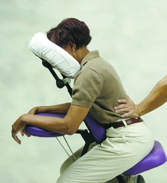 Picture of a Chair Massage being done on a female client